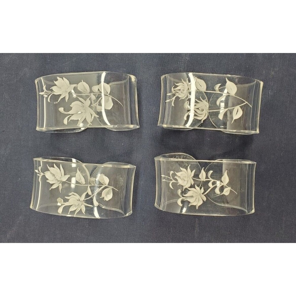 SET OF 4 MCM REVERSE CARVED CLEAR LUCITE NAPKIN RINGS FLORAL VINTAGE